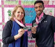  ?? [PHOTO PROVIDED] ?? Redbud Classic race Director Patty Anthony, left, and Profession­al Under Armour runner Frezer Legesse show off 2018 race medals.