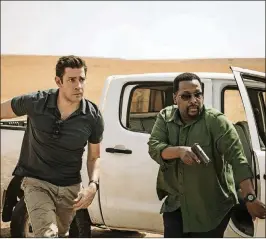  ?? PHOTO COURTESY OF JAN THIJS PHOTO COURTESY OF JAN THIJS ?? John Krasinski (left) and Wendell Pierce in “Tom Clancy’s Jack Ryan,” an eight-episode series available for streaming on Amazon Prime Video.