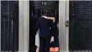 ??  ?? David Cameron hugs his family before leaving No. 10 for the last time
