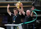  ?? Photograph: Reuters/Alamy ?? Richie McCaw and Graham Henry during the victory parade after New Zealand won the 2011 Rugby World Cup.