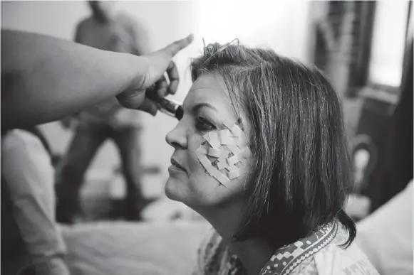  ??  ?? Actor Stephanie Norwood receives a makeup touch-up on the set of Vivian Gray's as-yet-untitled short film Aug. 7. BRANDON DILL / FOR THE COMMERCIAL APPEAL