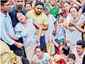  ??  ?? Family members of Bhaskar Kalita, who died in an encounter with ULFA (I), mourn his death at Majiri village in Palashbari, Kamrup