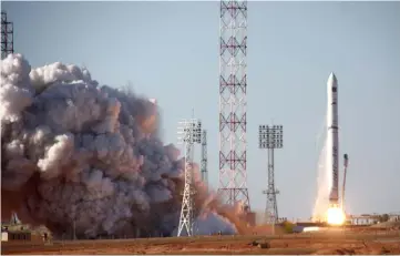  ?? — AFP photo ?? File photo shows a Zenit 3F rocket carrying the Spektr-R radio astronomy observator­y blasting off from the Russian leased Kazakhstan’s Baikonur cosmodrome.