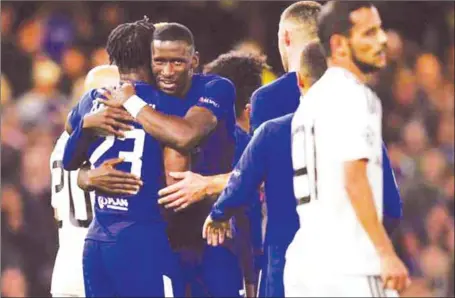  ??  ?? Michy Batshuayi (left) and team mates celebratin­g Chelsea’s 6-0 demolition of Qarabag in the UEFA Champions League group stage …last night