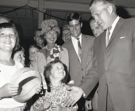  ?? John McBride / The Chronicle 1964 ?? George Romney (right) arrives at SFO for the 1964 Republican convention with his family, including son Mitt (rear center).