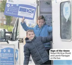  ??  ?? Sign of the times Robert McVicar (front) and Lawrie Flanagan on the bus