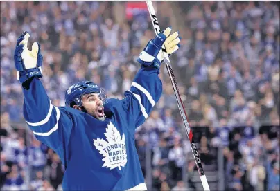  ??  ?? CP PHOTO In this file photo from last April, Toronto Maple Leafs centre Nazem Kadri (43) celebrates his goal against the Washington Capitals during second period NHL hockey round one playoff action in Toronto.