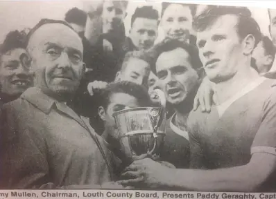  ??  ?? Paddy Geraghty, who helped Slane Manufactur­ing to victory in 1962, pictured here with Jimmy Mullen as Mattock Rangers accepted a Louth Div 2 title.