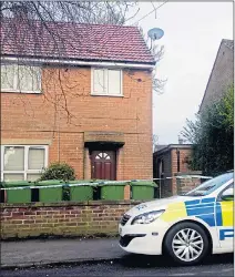  ?? Picture: THOMAS TEMPLE/SWNS ?? Police car outside the house where the body was found