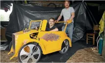  ?? BEJON HASWELL/STUFF ?? Jaxson Page, 15, and his dad Tony Page with their Soapbox racer ‘‘RamPage’,’ which is based on a 1932 Ford Roadster.