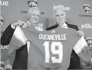  ?? LYNNE SLADKY/AP ?? GM Dale Tallon, left, welcomes Joel Quennevill­e as the Panthers’ new head coach on April 8, 2019, in Sunrise.