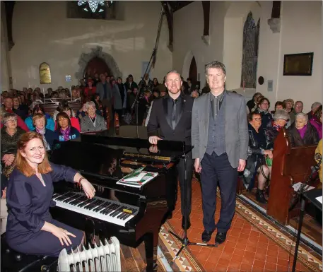  ?? Photo courtesy Arts Office at Kerry County Council ?? Pianist Aoife O’Sullivan, internatio­nal star baritone Gavin Ring and UCD Professor Muiris Bric at the World War One commemorat­ion at St John The Baptist church at Knightstow­n in Valentia on Sunday.
