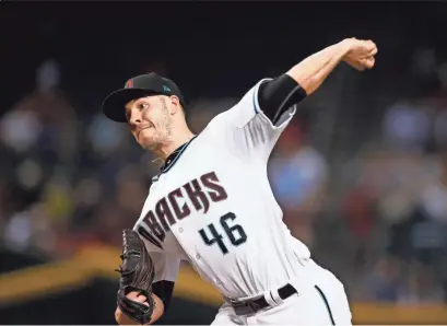  ?? ROSS D. FRANKLIN/AP ?? Diamondbac­ks starter Patrick Corbin throws a pitch against the San Diego Padres during the first inning of Friday night’s game at Chase Field. Corbin was hit hard early and the D-Backs fell 10-6 in a game that finished too late for full coverage. Visit...