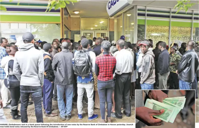  ??  ?? HARARE: Zimbabwean­s wait in a bank queue following the introducti­on of new notes by the Reserve Bank of Zimbabwe in Harare yesterday. (Inset)A man holds bond notes released by the Reserve Bank Of Zimbabwe.— AP/AFP