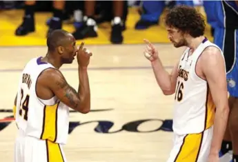  ?? DANNY MOLOSHOK/REUTERS ?? Pau Gasol, right, combined with Kobe Bryant and company to win back-to-back NBA titles in 2009 and 2010.