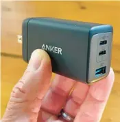  ?? DAVID CARNOY/CNET ?? The Anker 735 3-Port 65W USB-C charger can charge a MacBook Pro 13 at full speed.