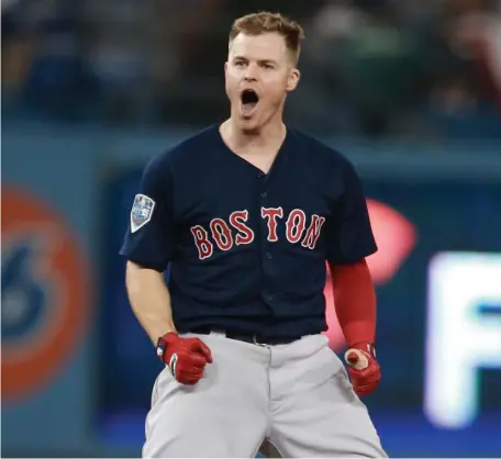  ?? MATT STONE / HERALD STAFF FILE ?? KEY PIECE: Brock Holt celebrates his double during the ninth inning of Game 4 of the World Series against the Los Angeles Dodgers on Oct. 27, 2018.