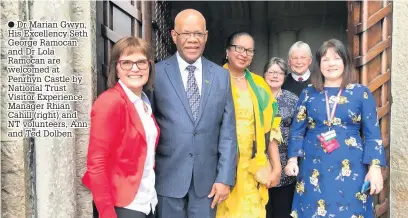  ??  ?? Dr Marian Gwyn, His Excellency Seth George Ramocan and Dr Lola Ramocan are welcomed at Penrhyn Castle by National Trust Visitor Experience Manager Rhian Cahill (right) and NT volunteers, Ann and Ted Dolben.