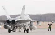  ?? JASON FRANSON / THE CANADIAN PRESS FILES ?? Critics have accused the Liberals of manufactur­ing a crisis to avoid a competitio­n to replace the CF-18s.