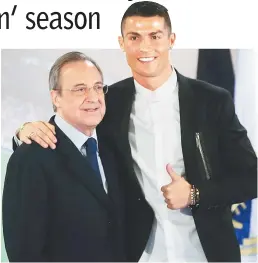 ??  ?? Real Madrid’s Cristiano Ronaldo (right) poses with the club’s president Florentino Perez after a ceremony for Ronaldo’s contract renewal at Santiago Bernabeu stadium in Madrid, Spain. — Reuters photo