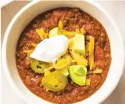  ?? JOE KELLER/AMERICA’S TEST KITCHEN VIA AP ?? This recipe for Easy Beef Chili appears in the cookbook “Multicooke­r Perfection,” below.