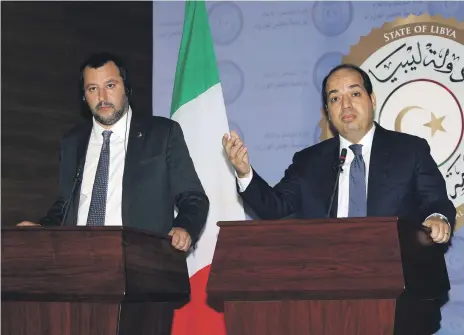  ?? AFP ?? Italy’s Interior Minister, Matteo Salvini, left, and Libya’s Deputy Prime Minister, Ahmed Maiteeq, at a news conference yesterday in Tripoli. Despite human rights problems, Mr Salvini says, Libya is a ‘great opportunit­y’