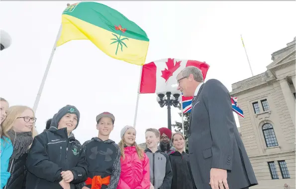  ?? MICHAEL BELL ?? Premier Brad Wall greets students from Miller Comprehens­ive outside the Legislativ­e Building on Wednesday.