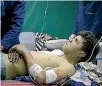  ?? PHOTO: GETTY IMAGES ?? A wounded man receives medical treatment at a hospital after Assad regime air strikes hit Zamalka, part of eastern Ghouta, in Damascus, Syria, last week.