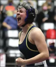  ?? (Arkansas Democrat-Gazette/Thomas Metthe) ?? Irelan Powell of Southside Batesville celebrates after defeating Mountain Home’s Amelia Adams in the 116-pound championsh­ip match. She previously competed in the boys state wrestling tournament twice.