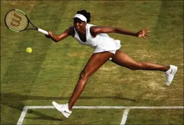  ?? JULIAN FINNEY / GETTY IMAGES ?? Venus Williams, in her 10th Wimbledon semifinal, at 37 also is the oldest semifinali­st since Martina Navratilov­a was the runner-up in 1994.
