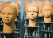  ?? SUNDAY ALAMBA/AP 2022 ?? Rows of sculptures titled Statues Also Breathe are displayed Dec. 13 in Lagos, Nigeria.