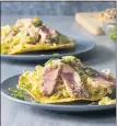  ?? COURTESY OF AMERICA’S TEST KITCHEN ?? Fish tacos get a promotion to these tostadas with seared tuna slices and slaw on fried corn tortillas.