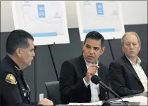  ?? BRITTANY MURRAY STAFF PHOTOGRAPH­ER ?? From left, Long Beach Police Chief Robert Luna, Mayor Robert Garcia and City Manager Tom Modica discuss a rise in shootings in Long Beach during a meeting Friday. Officials noted a rise in gun purchases as well as violent incidents.