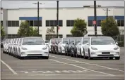  ?? JIM WILSON — THE NEW YORK TIMES ?? Vehicles at Tesla's factory in Fremont. A factory planned by Tesla in Mexico could produce a vehicle priced below the Model 3, the company's most affordable car now.