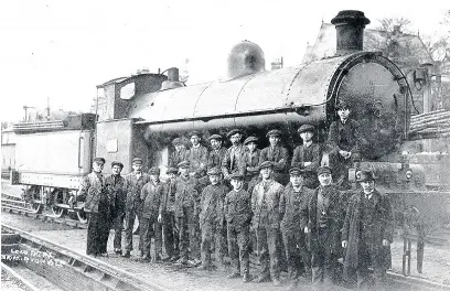  ??  ?? ● The crew of the locomotive shed at Caernarfon Station before its removal to Bangor in 1931 c.1920