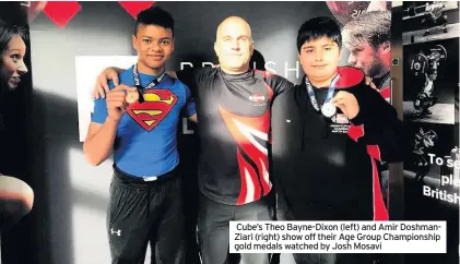  ??  ?? Cube’s Theo Bayne-Dixon (left) and Amir DoshmanZia­ri (right) show off their Age Group Championsh­ip gold medals watched by Josh Mosavi