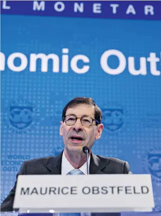  ?? ANDREW HARRER/BLOOMBERG ?? Maurice Obstfeld, chief economist with the Internatio­nal Monetary Fund, speaks at a World Economic Outlook news conference in Washington, D.C, on Tuesday.