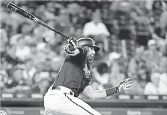  ?? RICK OSENTOSKI/USA TODAY SPORTS ?? A late September double by Twins center fielder Jake Cave was changed to a two-base error after the regular season ended, thus changing his batting average.