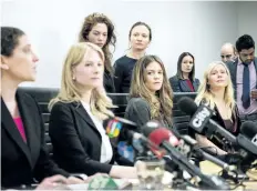  ?? CHRISTOPHE­R KATSAROV/THE CANADIAN PRESS ?? Lawyers Alexi Wood (left) and Tatha Swann (second from left) and plaintiffs Hannah Miller, Patricia Fagan, Diana Bentley and Kristin Booth attend a press conference after filing lawsuits alleging sexual harassment by Soulpepper Theatre Company director...