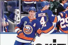  ?? Frank Franklin II / Associated Press ?? The Islanders’ Brock Nelson (29) smiles after scoring a goal during the first period against the Washington Capitals on Thursday in Elmont, N.Y.