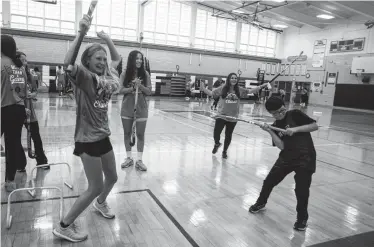  ?? PHOTOS BY SETH HARRISON/THE JOURNAL NEWS ?? Aaron Chica Ledesma, 6, of Bedford Hills is cheered on during an Able Athletics field hockey program at Fox Lane High School on Sept. 24.