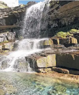  ??  ?? Who could resist a dip at the waterfall?