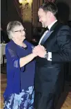  ??  ?? ALL IN THE FAMILY: Guest of honour and president of Loyola High School Paul Donovan hits the dance floor with mom Anne.