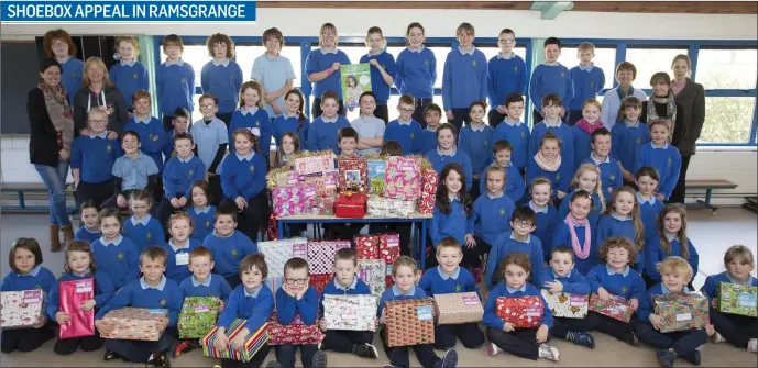  ??  ?? Ramsgrange school pupils and teachers photograph­ed with their shoeboxes for Team Hope for children in Eastern Europe, former Soviet Union and Africa.