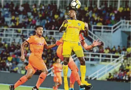  ??  ?? Pahang striker Mohamadou Sumareh (right) has already received his Malaysian citizenshi­p after living in the country since he was 13 years old and he is ready to answer a call-up to the national team.