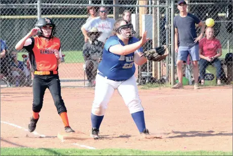  ??  ?? LaFayette Middle School’s Kayli Ballard sprints to first base to beat out an single in a game against Rossville last week as Lady Bulldogs first baseman Abby Ford awaits the throw. (Messenger photo/Scott Herpst)