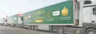  ?? ?? ◼ طابور من الشاحنات التى حتمل املساعدات لغزة