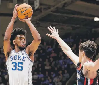  ?? | AP ?? Marvin Bagley III has shooting range and runs the floor like a guard. He’s a tweener like Lauri Markkanen.