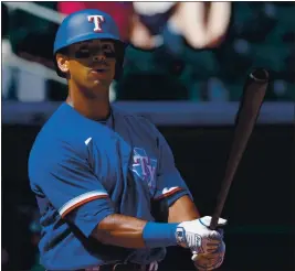  ?? CHRISTIAN PETERSEN — GETTY IMAGES ?? Khris Davis joined the Texas Rangers after hitting 158 homers and driving in 418 runs over the past five seasons with the A’s. He slugged a career-high 48 home runs in 2018.