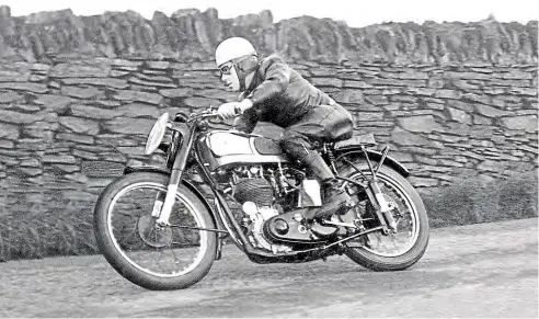  ??  ?? Demonstrat­ing the Duke style with his first win over the Isle of Man Mountain circuit, claiming the 1949 Clubman’s Senior TT victory.